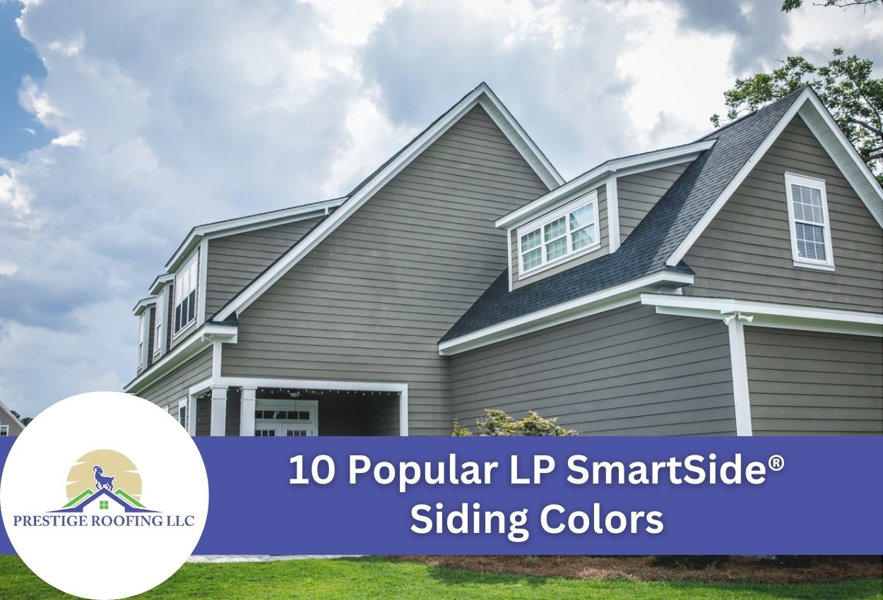 Modern two-story house with gray LP SmartSide siding and blue sky backdrop.