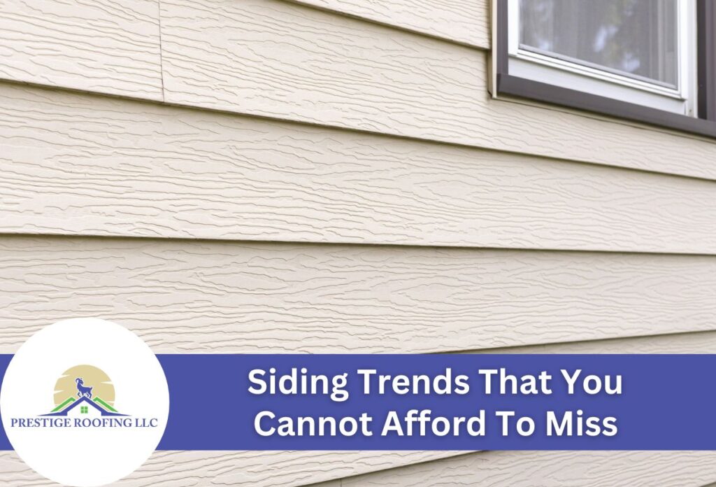 Close-up view of modern siding on a house with window above.