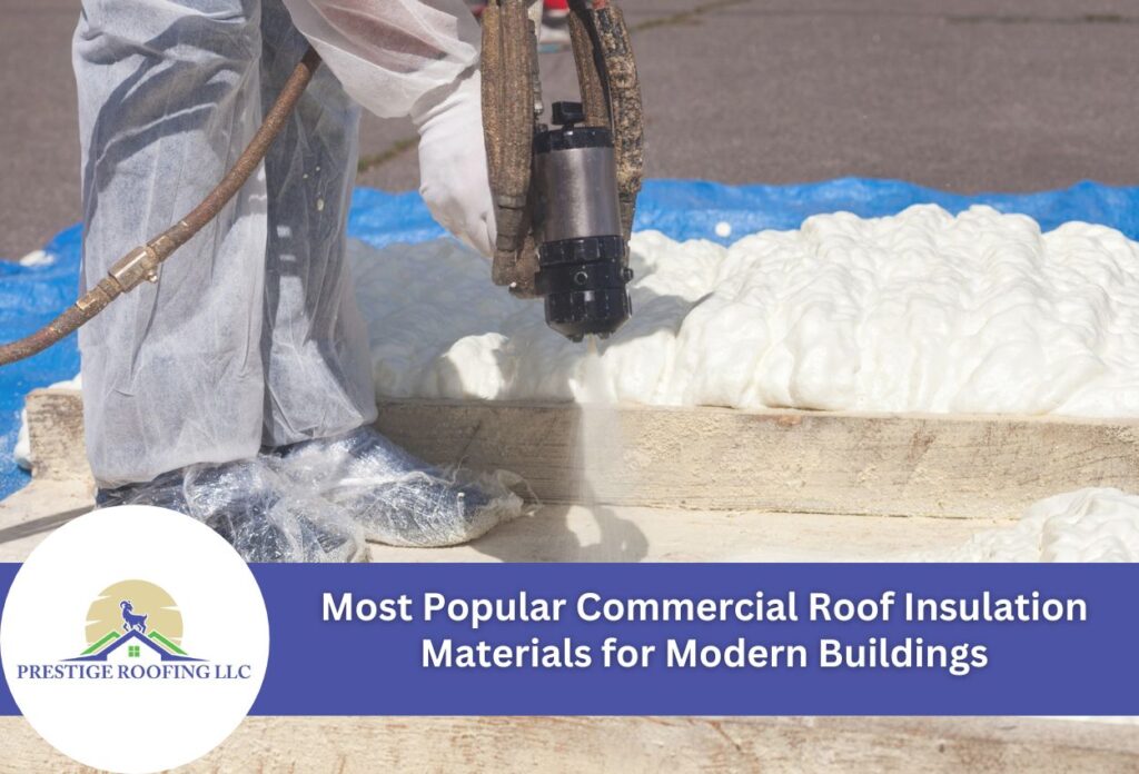Worker applying spray foam insulation to commercial roof surface using professional equipment